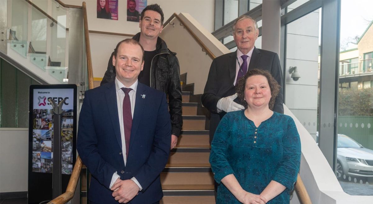 SERC - Economy Minister Gordon Lyons pictured at South Eastern Regional College's SPACE campus in Bangor with Ken Webb, Principal of South Eastern Regional College; SERC student Helen McFarlane; and former SERC student David Campbell.